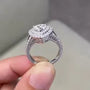 Heart cut diamond ring with double halo