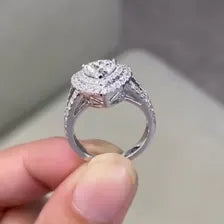 Heart cut diamond ring with double halo