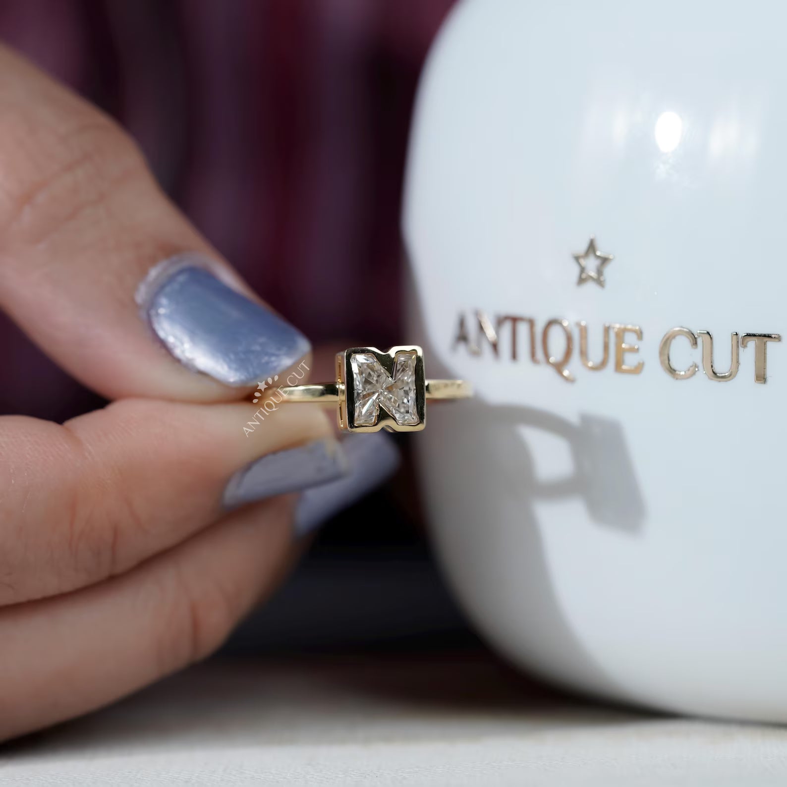 Diamond N initial ring with bezel setting and yellow gold finish
