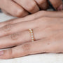 Diamond eternity band featuring round brilliant diamonds