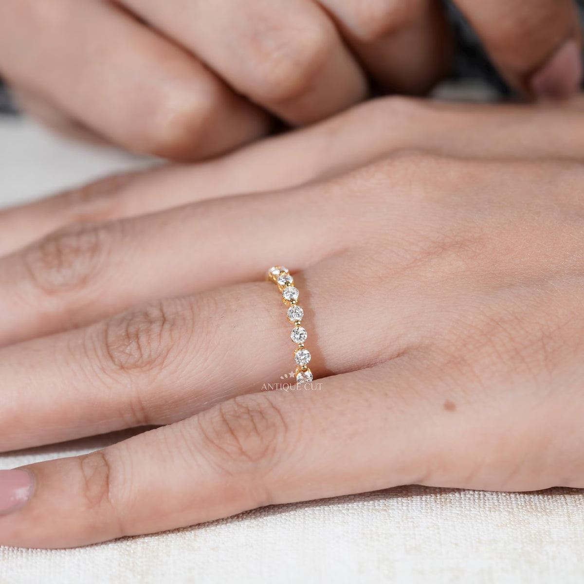 Diamond eternity band featuring round brilliant diamonds