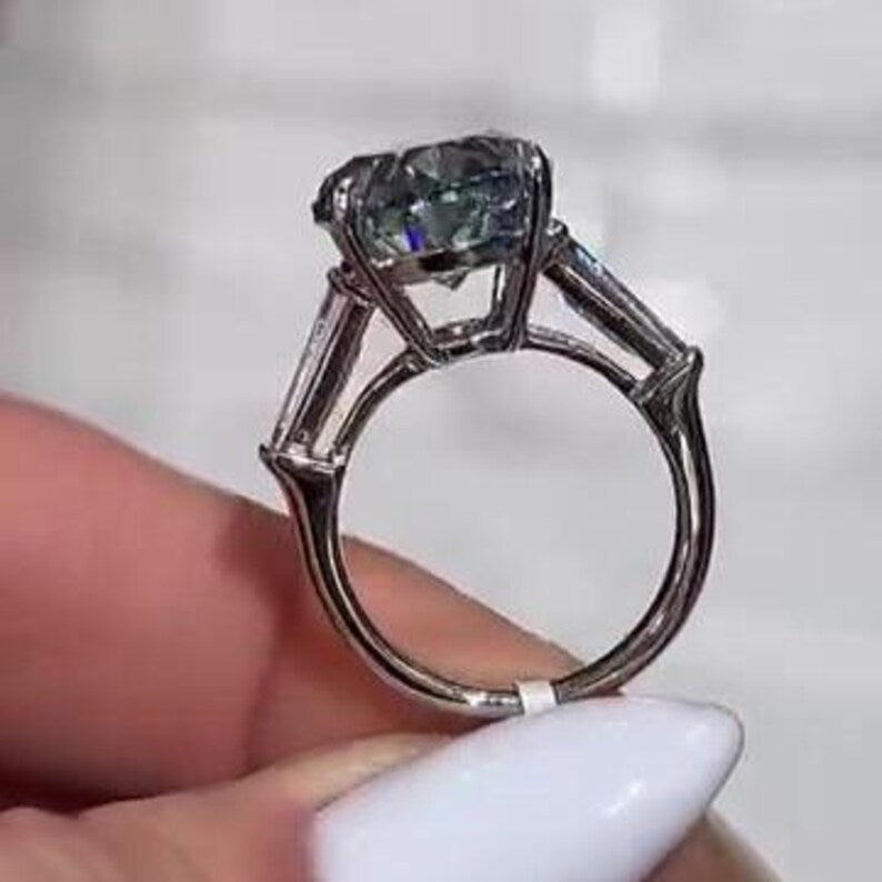 Oval Fancy Blue 8.50tcw Lab Diamond Ring | Three Stone Baguette Sides | Cathedral Shank | IGI Certified VVS–VS