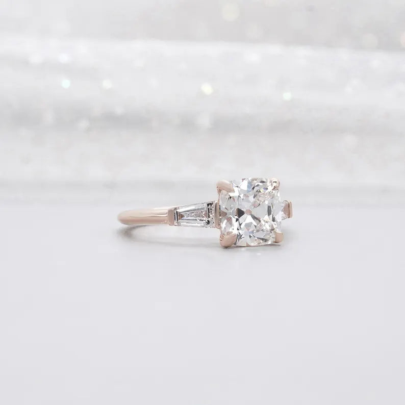 Old mine cushion engagement ring with 4 prong setting
