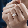 Rose gold cushion cut three stone engagement ring