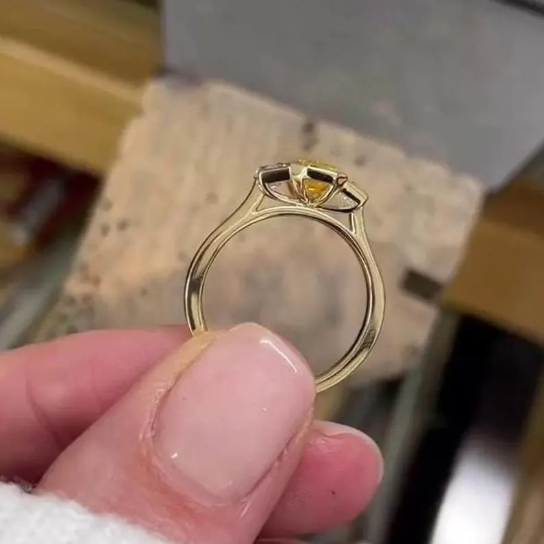 Fancy Yellow Emerald 1.50tcw Lab Grown Diamond Three Stone Ring | IGI Certified VVS–VS