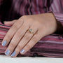 Yellow gold N initial ring featuring bezel set lab grown diamonds