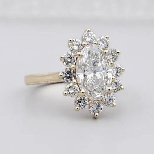 Diamond vintage floral oval halo ring