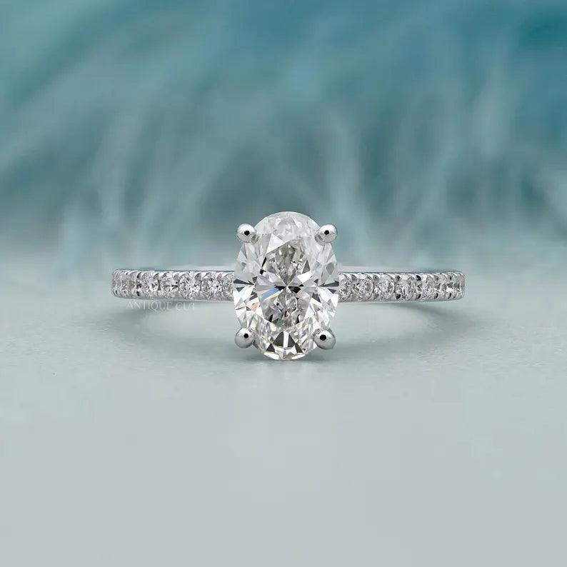 Oval pave engagement ring in white gold