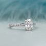 White gold oval pave engagement ring