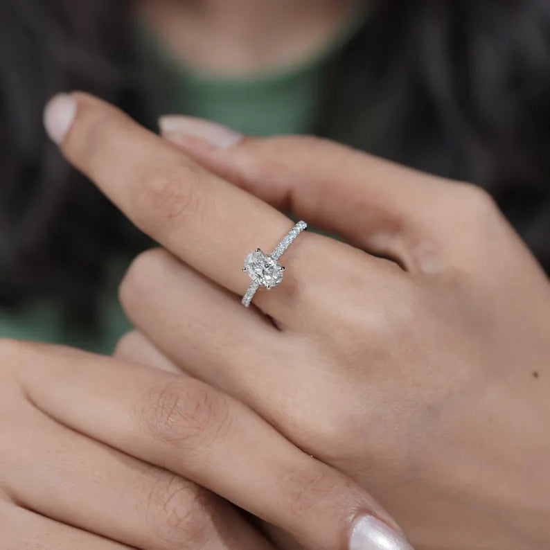 Elegant white gold oval diamond engagement ring