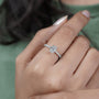 White gold oval engagement ring with pave diamonds