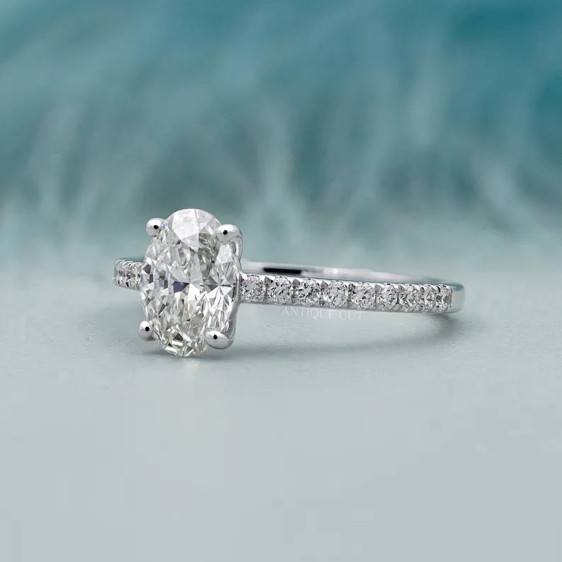 Antique cut engagement ring with oval diamond