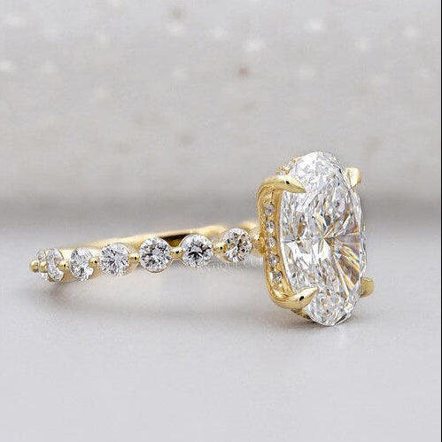 Oval lab grown diamond ring with 4 prong setting