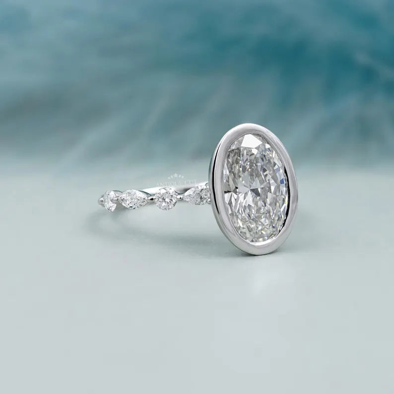 Oval 3.50tcw Bezel Set Lab Grown Diamond Engagement Ring | Yellow Gold with Side Stones | IGI Certified