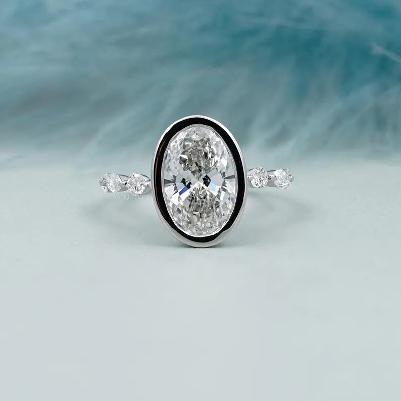 Oval 3.50tcw Bezel Set Lab Grown Diamond Engagement Ring | Yellow Gold with Side Stones | IGI Certified