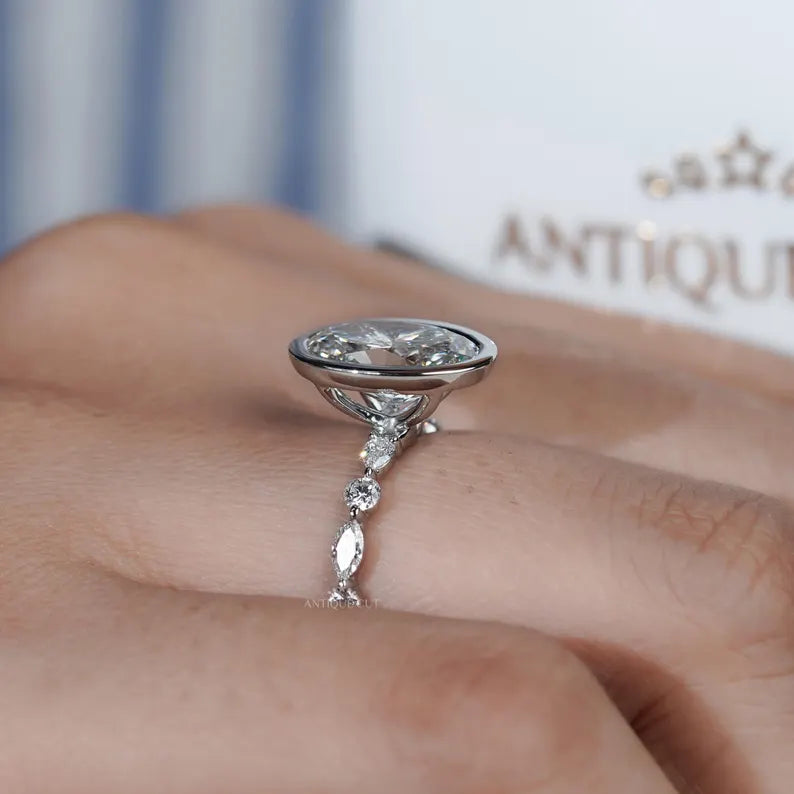 Oval 3.50tcw Bezel Set Lab Grown Diamond Engagement Ring | Yellow Gold with Side Stones | IGI Certified