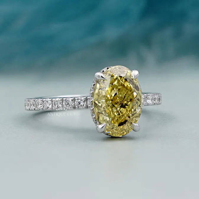 IGI certified yellow oval diamond ring hidden halo