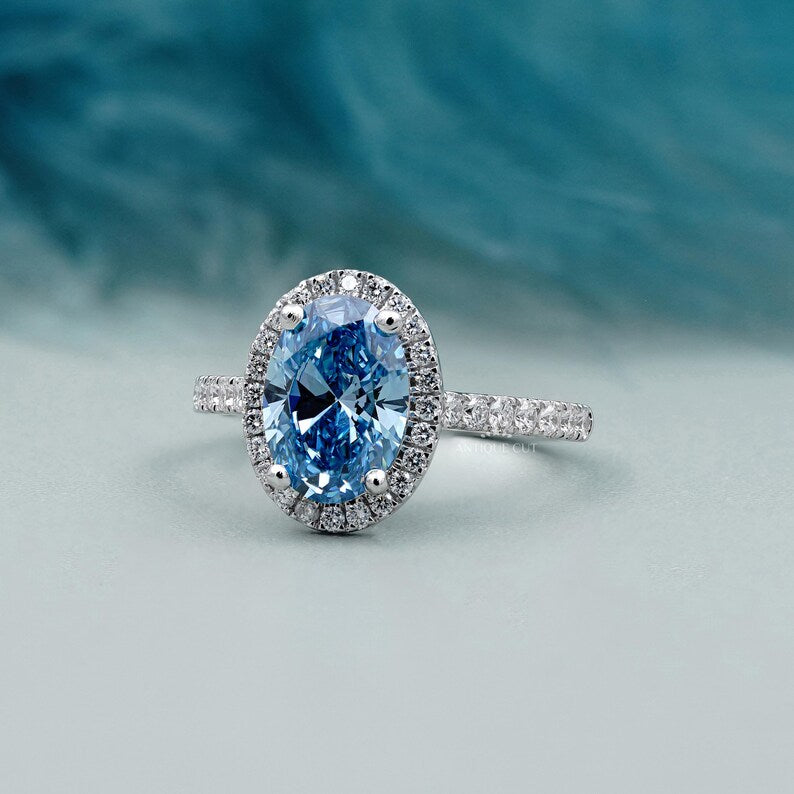 Fancy Blue Diamond Ring | Oval Halo Engagement Ring With Pave Band | IGI Certified