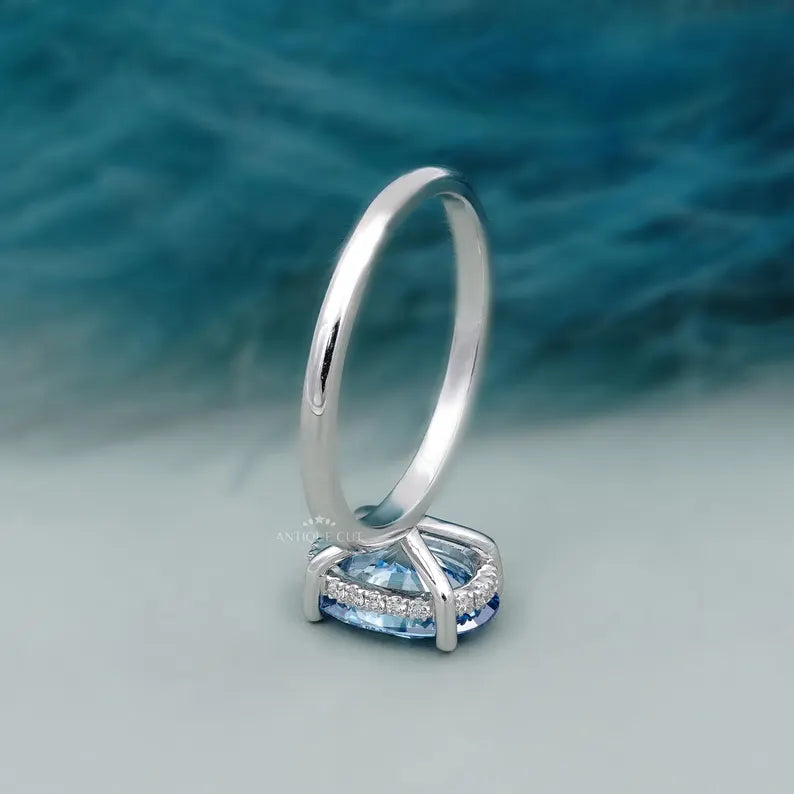 Antique cut blue diamond solitaire engagement ring
