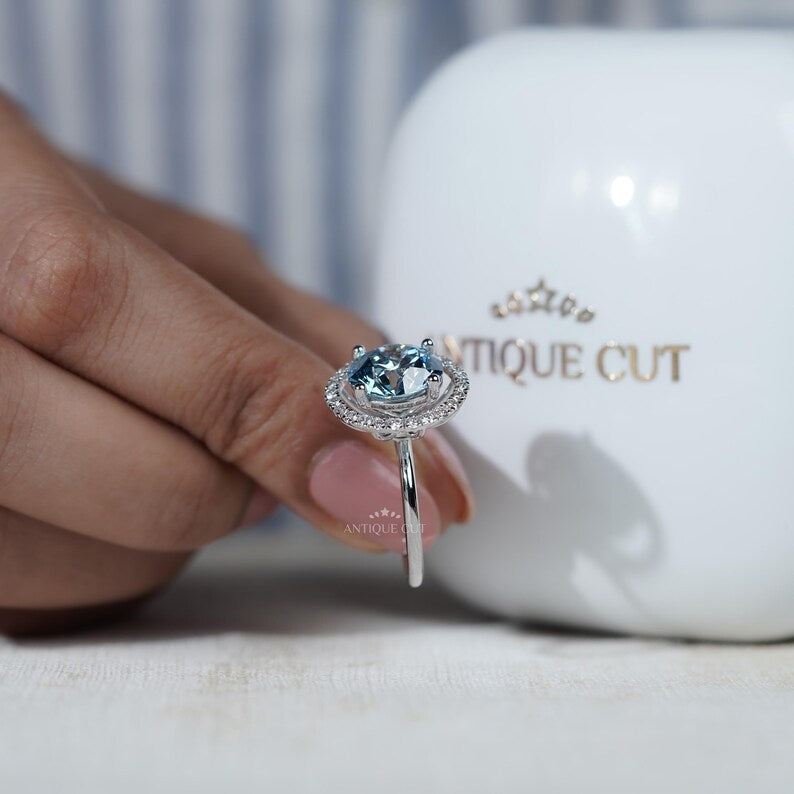 Elegant Fancy Blue Diamond Ring with Halo