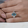 Elegant cushion blue diamond ring white gold