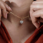14K gold halo heart necklace with shimmering diamond surround