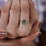 Yellow gold bezel set fancy green cushion cut ring