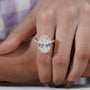 Luxury oval cut engagement ring with round side diamonds