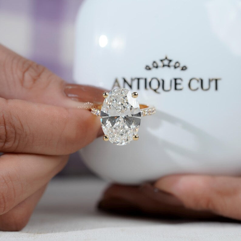 Elegant oval cut diamond engagement ring by Antiquecut