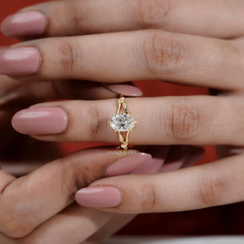 Floral leaf design oval diamond engagement ring profile