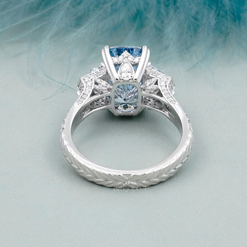 Lab grown cushion blue diamond ring white gold