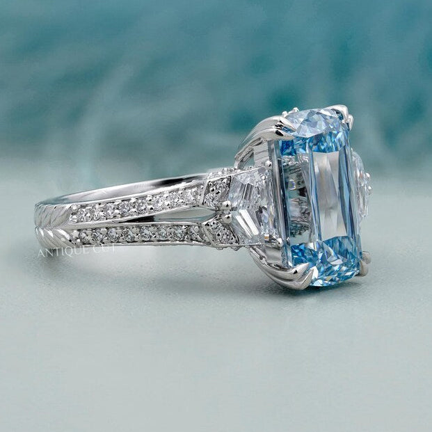 Platinum vintage style cushion blue diamond ring