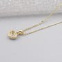 Close up of heart diamond halo pendant