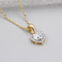 round diamond halo in yellow gold