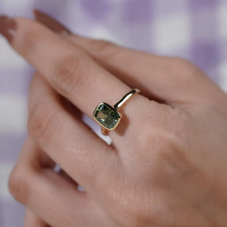 Elegant solitaire bezel diamond ring.