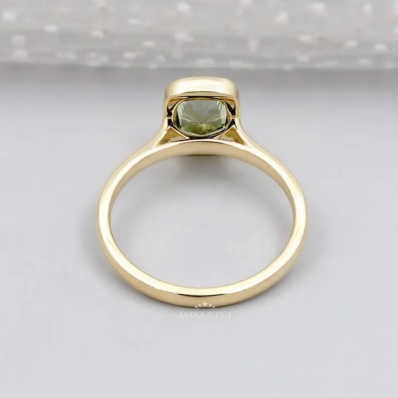 IGI certified fancy green bezel cushion cut ring