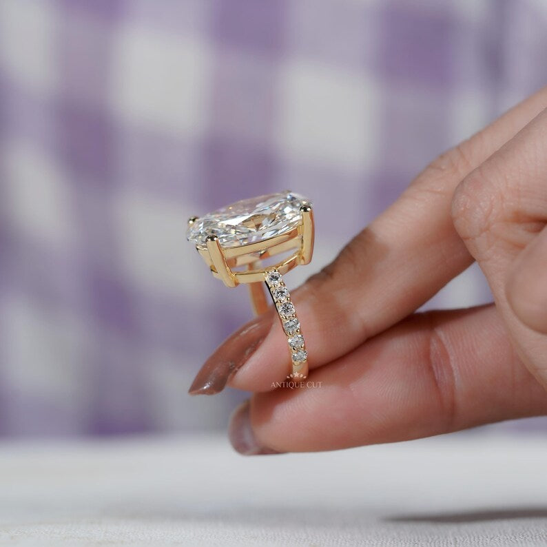 Oval lab grown diamond ring four prong solitaire setting