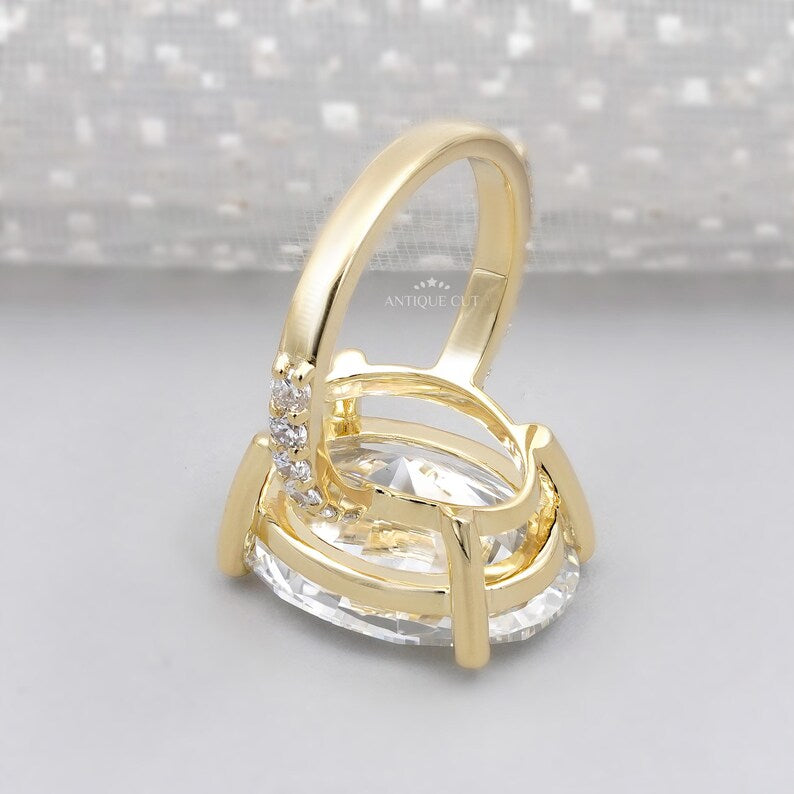 Oval lab diamond ring with round cut pavé band 