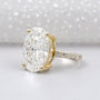 Large oval lab grown diamond ring with round side stones