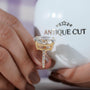 Yellow gold oval engagement ring with sparkling pavé setting