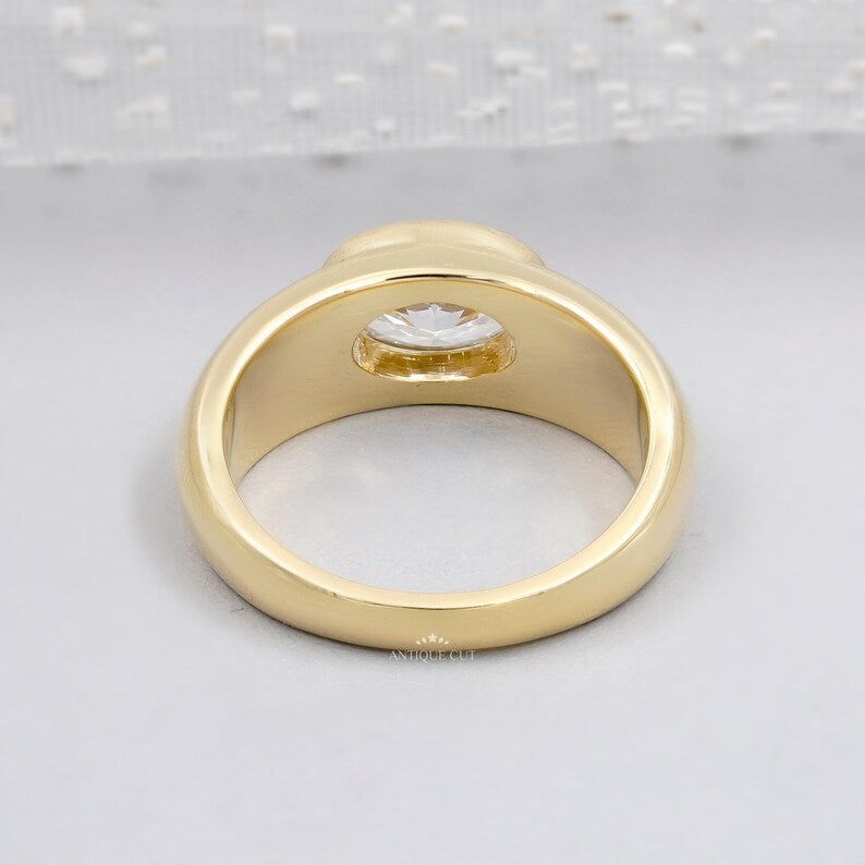 Bezel setting oval engagement ring in solid gold