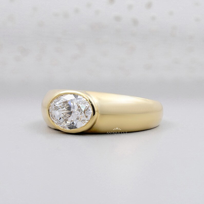 Antiquecut engagement ring with east west oval diamond