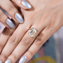 Close-up of bezel set emerald cut diamond