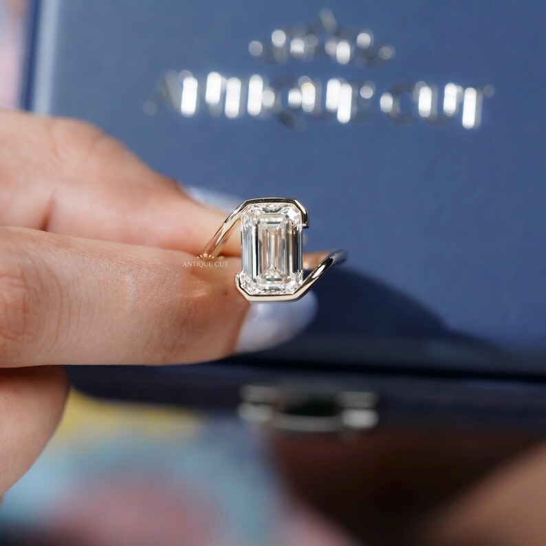 Modern bezel set engagement ring style