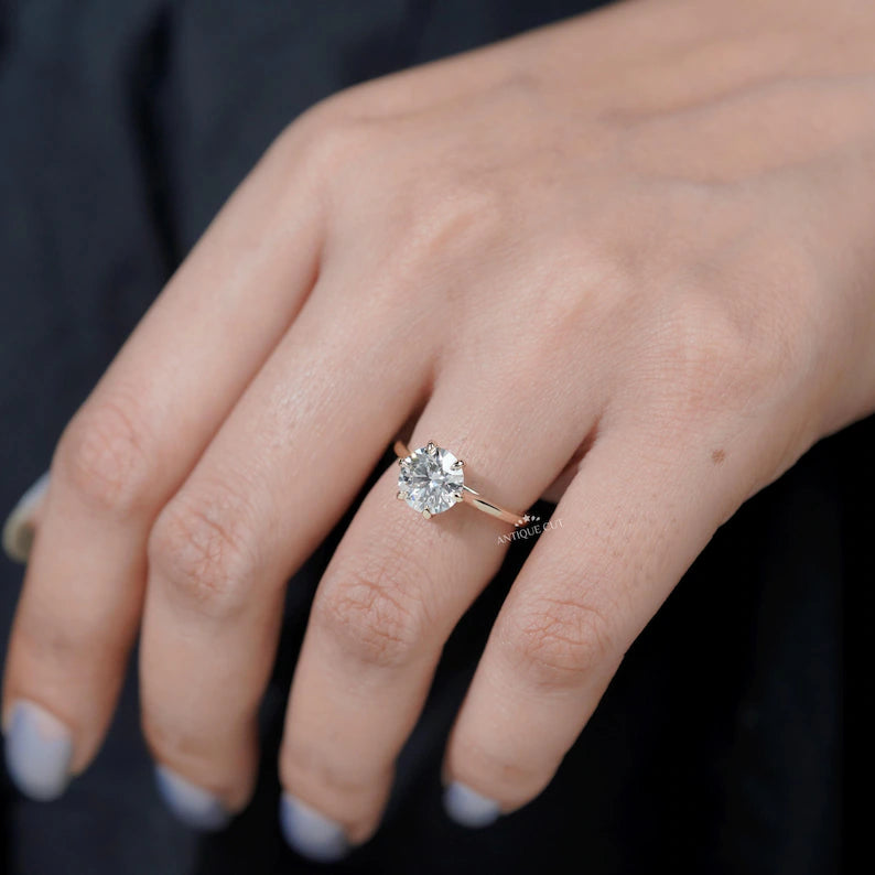 Close-up of round cut solitaire diamond ring