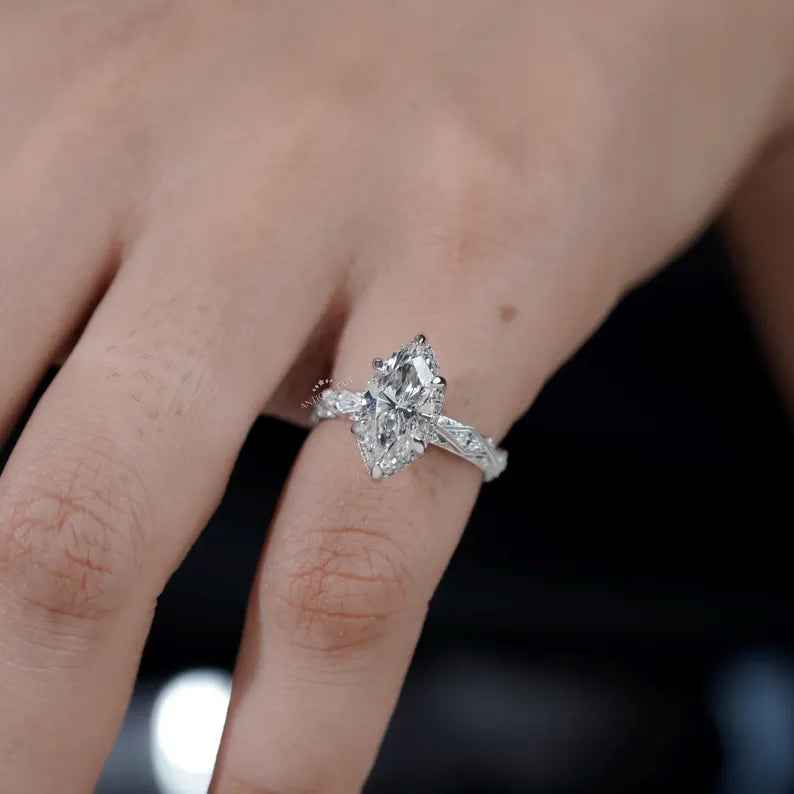 Close-up of marquise diamond engagement ring