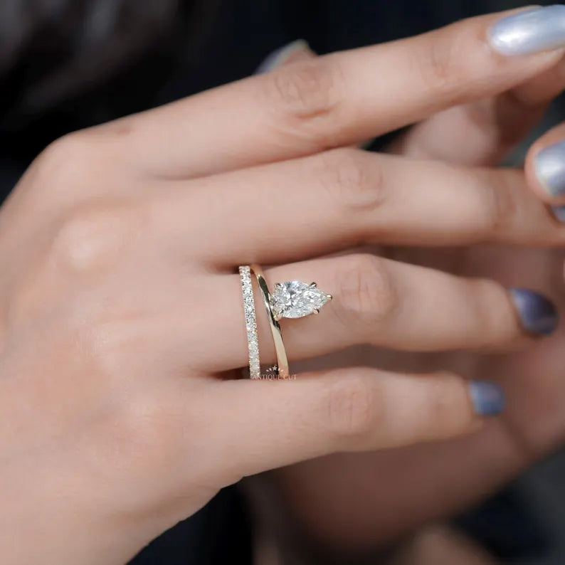 Contemporary Pear Cut Diamond Ring