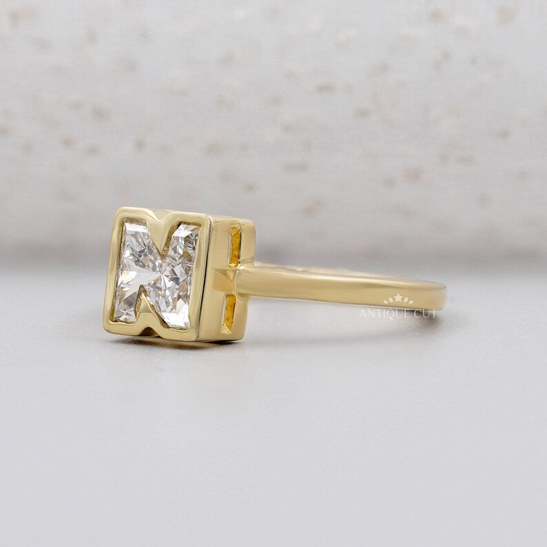 Antique cut N letter diamond ring yellow gold