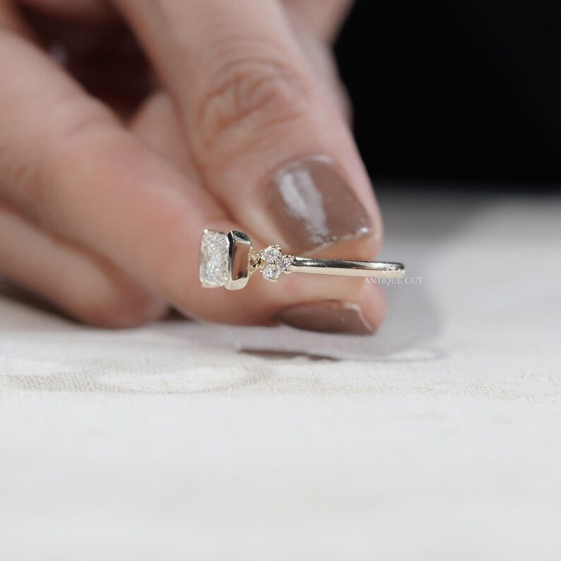 East west lab grown emerald diamond engagement ring minimalist style
