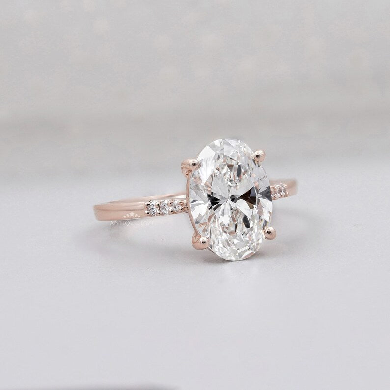 Lab grown oval diamond engagement ring rose gold pave design